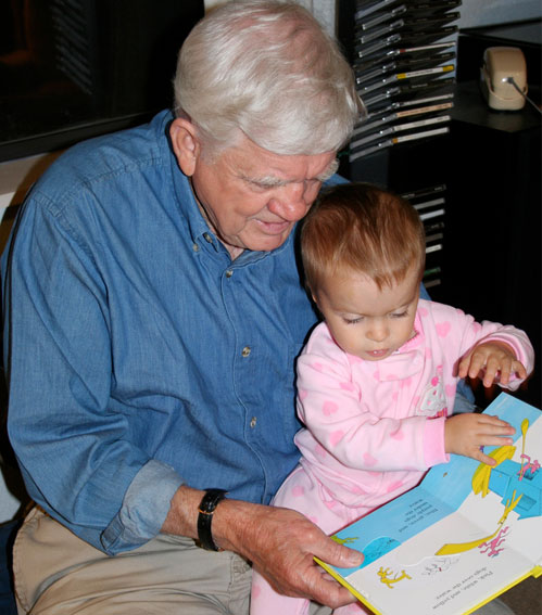 Reading with grandpa - image by Flickr user Phil Scoville