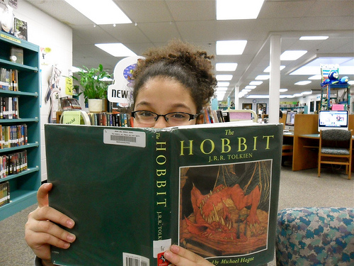 Reading The Hobbit, by Flickr user The Daring Librarian